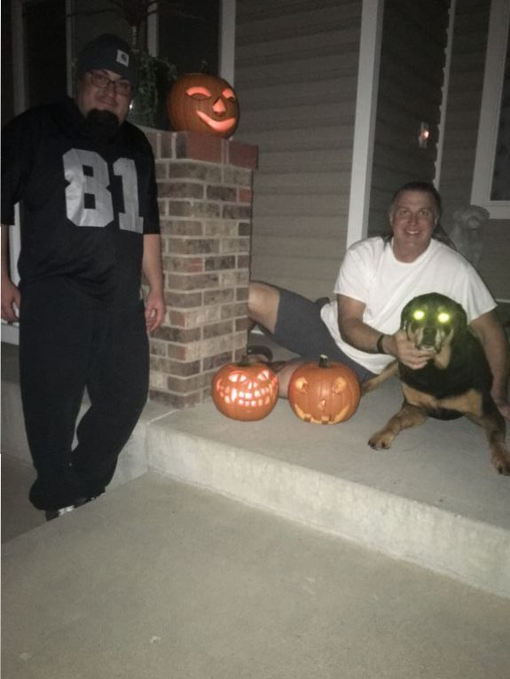 Justin, Dad and I got to pose with the pumpkins. Gotta love the laser eyes.